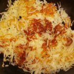 hashbrowns in a cast iron skillet