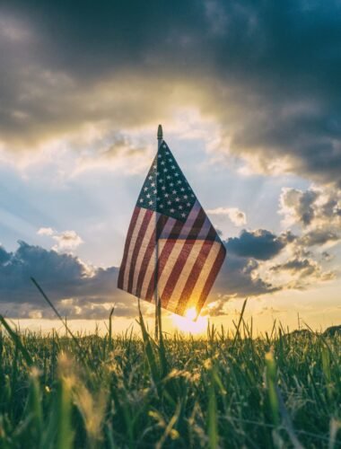 flag of USA on grass field