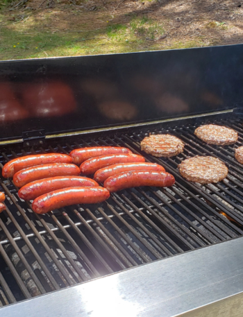 hotdogs and hamburgers on a grill